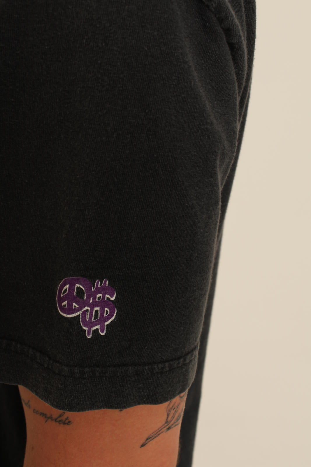 Stüssy Graphic Tee Black with Purple Logo